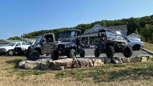 UTV owner in gear searching for a reliable HiSun UTV dealer.